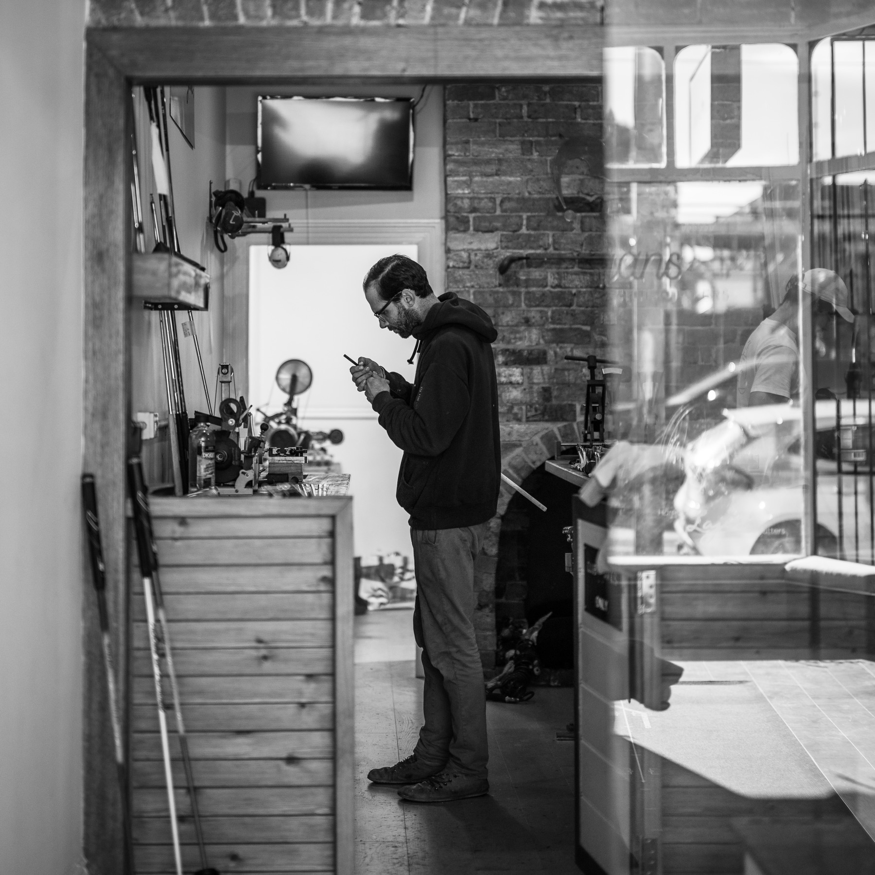Adam in the Mulligans workshop